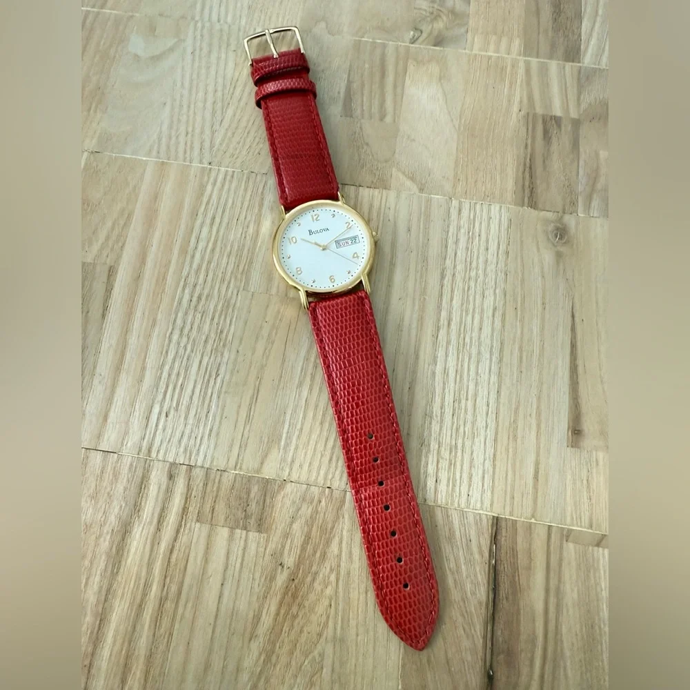 Bulova gold tone red leather watch NEW BATTERY